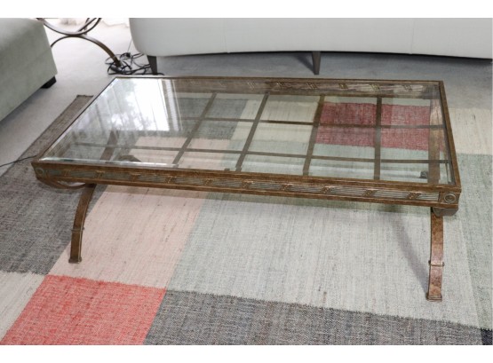Metal And Glass Coffee Table With Beveled Glass And Detailed Apron