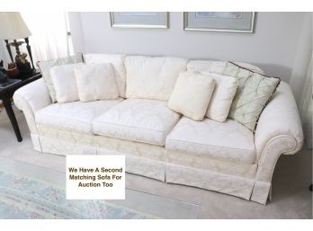 Off White Damask Sofa By Heritage With Decorative Pillows