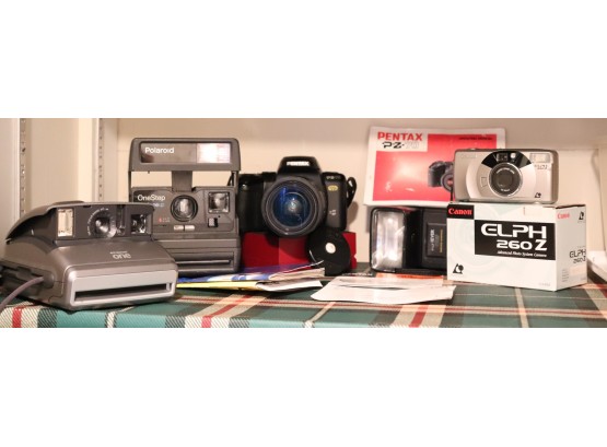 Assorted Cameras Includes Pentax PZ 70, Canon ELPH 260-Z And Polaroid Cameras