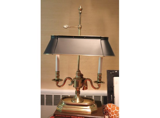 Brass Lamp With Stack Of Architectural Digest Books