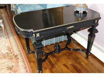 Black Carved Side Table With Gold Detail Accents Design Carved Into Center Of Table