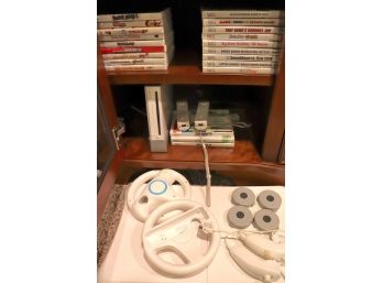 Large Nintendo Wii Lot Includes System, Games, Guitar And Controllers