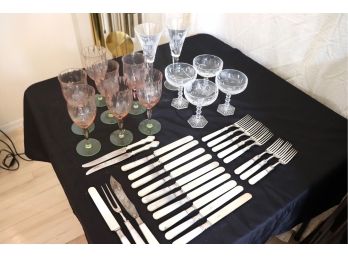 Assorted Lot Includes Mother Of Pearl And Sterling Handle Flatware With Waterford Champagne Flutes