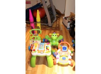 Lot Of Children's Push Toys And Learning Table With Large Crayon Coin Banks