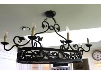 Metal And Candle Style Counter Light Fixture With Lights On Bottom