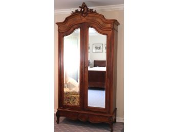 Large Mirrored Armoire Cabinet With Carved Center Crown Detail