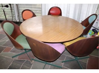 Vintage 54' Round Formica Table Set On Metal Base With Multi Colored Chairs Made In Denmark