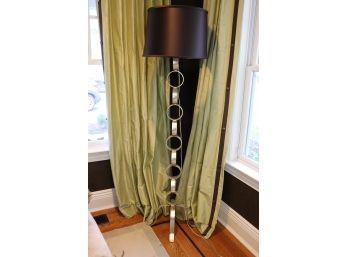 Tall Contemporary Ring-Shaped Floor Lamp With Shiny Silver Finish And Decorative Brown Shade