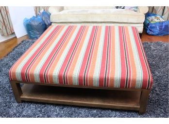 Large Oversized Ottoman Table With Multicolored Striped Pattern Fabric Has A Bottom Shelf Great For Storage