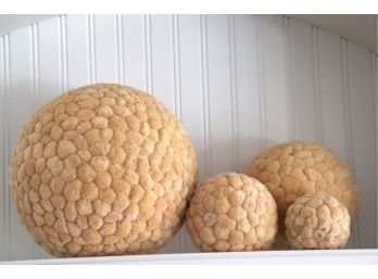 Set Of Decorative Display Balls With Fuzzy Like Texture Ranging In Sizes