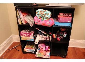 Small Storage Cube Filled With Kids Books, Puzzles And More