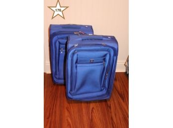 2 Medium Blue Delsey Suitcases With Pull Handles