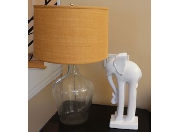Oversized Clear Glass Jug Table Lamp With Burlap Shade & Tall Ceramic Elephant Sculpture