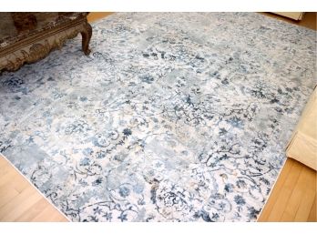Large Area Rug(710W X 1010L) In Multi Color Blue On Cream With Yellow Accents Throughout