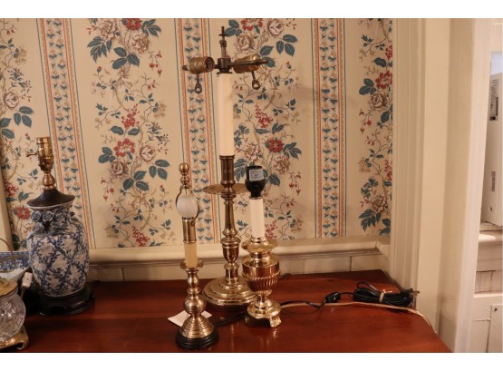 TALL HEAVY 24 BRASS CANDLELIGHT STYLE LAMP WITH 2 LIGHTS ACCOMPANIED BY 2 SMALLER BRASS LAMPS