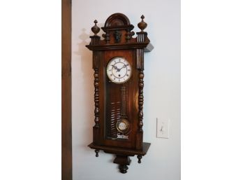 CARVED WOOD REGULATOR WALL CLOCK WITH PENDULUM AND CARVED FEMALE FACE ALONG TOP, BEAUTIFUL PIECE!