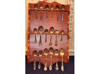 DECORATIVE COLLECTIBLE SPOONS WITH WOOD DISPLAY INCLUDES 17 STERLING SILVER SPOONS