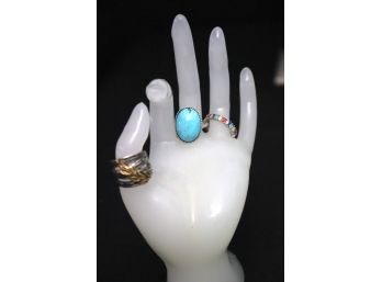3 STERLING RINGS INCLUDES GOLD TONE LEAF DETAIL ISRAEL 7.5, POLISHED TURQUOISE SIZE 7, SILVER RAINBOW SPARKLE