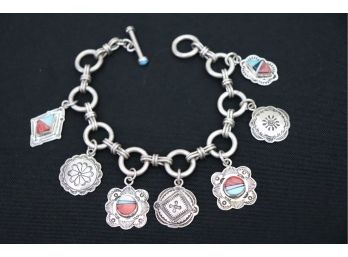 STERLING CHARM BRACELET WITH 7 ASSORTED HANDMADE CHARMS WITH CUT STONE PIECES 8' LONG, CAN SHIP