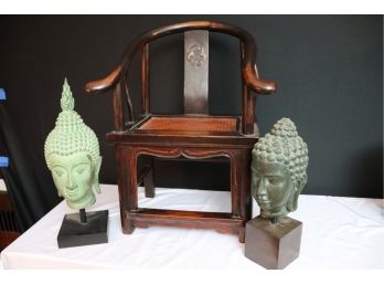 VINTAGE CHILDS SIZE CHAIR WITH CANE STYLE SEAT AND ASIAN MOTIF ACCOMPANIED BY 2 LARGE BUDDHA HEAD STATUES