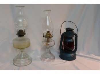 3 VINTAGE OIL LAMPS INCLUDES 12 BLUE DIETZ LANTERN AND VINTAGE GLASS OIL HURRICANE LAMPS