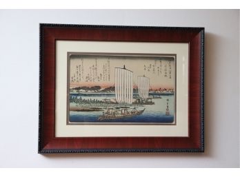 REPRODUCTION JAPANESE WOODBLOCK PRINT STAMPED WITH ASIAN CHARACTERS IN A MATTED FRAME