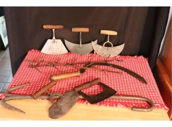 ANTIQUE PRIMITIVE KITCHEN TOOLS INCLUDES ASSORTED CHOPPING UTENSILS WITH HAND FORGED DRYING HOOKS & LARGE MEAT
