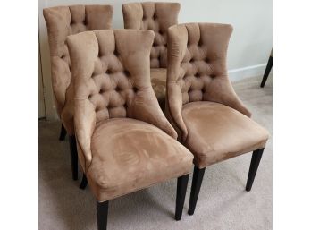 4 MODERN STYLE BROWN MOCHA SUEDE LIKE UPHOLSTERED CHAIRS WITH A CURVED TUFTED BACK & NAIL HEAD DETAIL