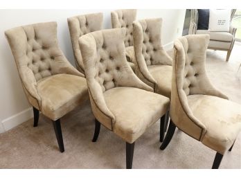 6 TAUPE COLORED MODERN STYLE SUEDE LIKE UPHOLSTERED CHAIRS WITH A CURVED TUFTED BACK & NAIL HEAD DETAIL