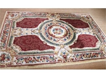 BEAUTIFUL TUFTED WOOL AREA RUG WITH FLORAL DESIGN & CENTER MEDALLION 69 W X 92 L
