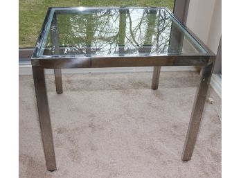 MODERN CHROME AND GLASS END TABLE WITH CHROME LEGS MEASURES 24 SQUARE X 20 TALL