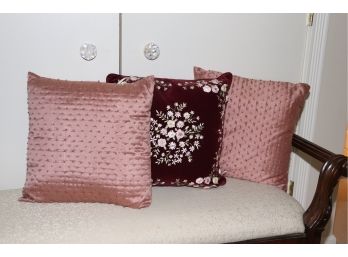 DECORATIVE CRANBERRY COLORED PILLOWS AND STITCHED FLORAL PILLOW