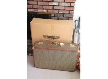 VINTAGE HARTMANN WINGS SUITCASE WITH BRASS AND LEATHER ACCENTS 29 W X 9 D X 19 TALL
