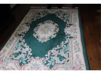 GREEN FLORAL AREA RUG WITH FRINGES AND CENTER MEDALLION MEASURES 90W X 60L