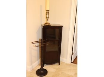 SMALL LINEN CABINET 20 W X 11 D X 44 TALL WITHTOWEL RACK AND DECORATIVE CANDLE