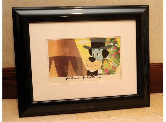 Framed Sericel Of Huckleberry Hound In Top Hat Hand Signed By Bill Hanna & Joe Barbera  23 Inches W X 18.5 InH