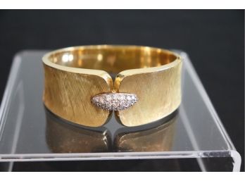 18KT Yellow Gold Bangle Cuff Bracelet With Brushed Finish With Approx 18 Graduating Diamond Cluster Center