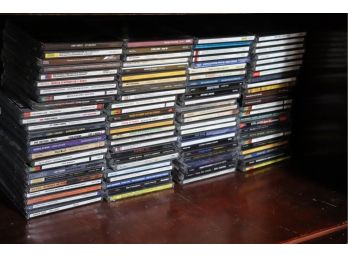 COLLECTION OF APPROXIMATELY 100 CDS INCLUDES THE BEATLES, ELTON JOHN, TOWER OF POWER, CHICAGO & MORE