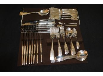 SET OF SILVER-PLATE FLATWARE, HOLDER NOT INCLUDED, APPROXIMATELY SERVICE FOR 8