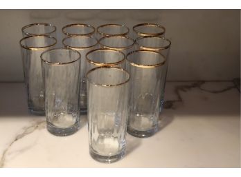 Collection Of 12 Tall Drinking Glasses With Gold Rim
