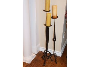 3 Tiered Wrought Iron Rustic Style Floor Standing Candlesticks With Amber Colored Wax Pillar Candles