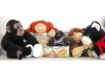 What A Fun Assortment Of Dolls And Monkeys
