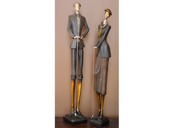 Pair Of Tall Sophisticated Golf Statues By Uttermost With Black & Tan Finish & Silver-Plated Details
