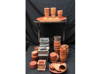 Garden Assortment Includes Clay Planters & On A Ceramic Tile Top Table With Wrought Iron Base