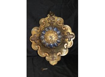 Ornate French Bronze Wall Clock With A Medieval Style Design & Fleur De Lys Adornments