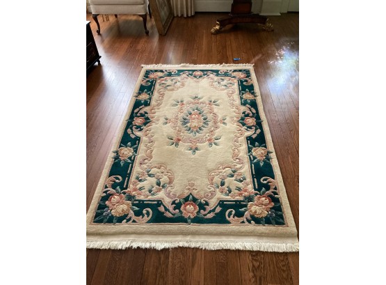 Hand Tufted Rug Rugs Is 72x45. Green Background