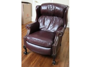 Sit Down And Relax In This Elegant Recliner With Nail Head Detail And Claw Feet