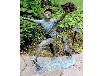 Whimsical Bronze Sculpture Of Boy With A Kite And Dog
