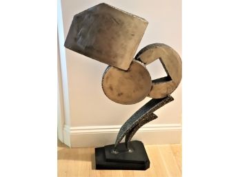 Metal Art Sculpture With A Polished Surface Signed On Bottom