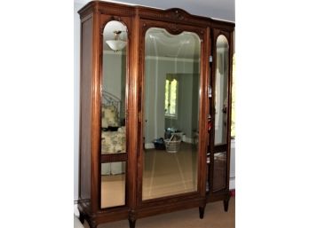 Large Mirrored Armoire Cabinet With Carved Fluted Crown And A Beveled Mirror See Description